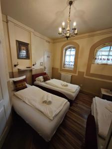 Postel nebo postele na pokoji v ubytování Guesthouse Yildiz