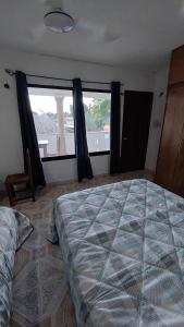 Letto o letti in una camera di Habitacion Codice Maya 1