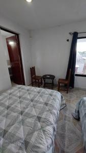 Letto o letti in una camera di Habitacion Codice Maya 1