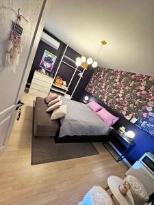 Posteľ alebo postele v izbe v ubytovaní Artists' Nest