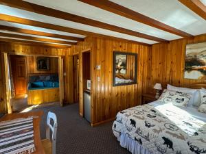 Postel nebo postele na pokoji v ubytování Xenia Lodge