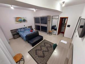 TV a/nebo společenská místnost v ubytování Pousada Casa Verde - Curitiba