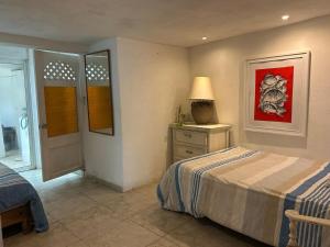 Ένα ή περισσότερα κρεβάτια σε δωμάτιο στο Acapulco, gro Junto al mar +5 φωτογραφίες