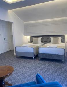 Uma cama ou camas num quarto em Hotel Garni Ideal