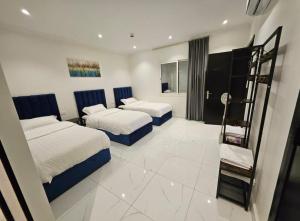 Rúm í herbergi á شقة بنظام فيلا مستقلة بالكورنيشapartment with villa system