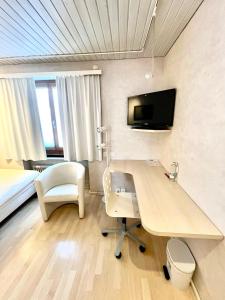 TV in/ali zabaviščno središče v nastanitvi Seiler's Hotel
