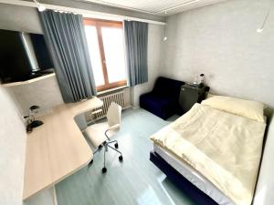 Postelja oz. postelje v sobi nastanitve Seiler's Hotel