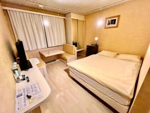 Postelja oz. postelje v sobi nastanitve Seiler's Hotel