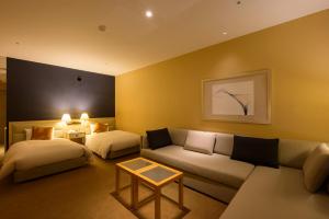 Posezení v ubytování Hotel Tangram + 37 fotografií