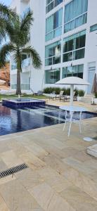 Swimmingpoolen hos eller tæt på Apto frente Rio SJ da Barra MG