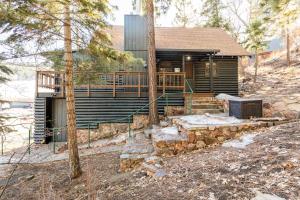 a log home with a porch and a deck at Chair 9 Chalet in Big Bear Lake