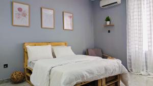 Vuode tai vuoteita majoituspaikassa Seven Space Coliving
