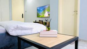 Vuode tai vuoteita majoituspaikassa Seven Space Coliving