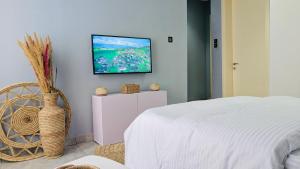 TV a/nebo společenská místnost v ubytování Seven Space Coliving