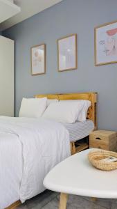 Vuode tai vuoteita majoituspaikassa Seven Space Coliving