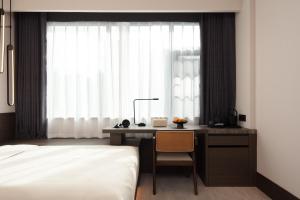 Voodi või voodid majutusasutuse Atour Hotel Changsha IFS International Finance Center Middle Jiefang Road toas
