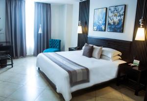 Voodi või voodid majutusasutuse Hotel Las Cascadas toas