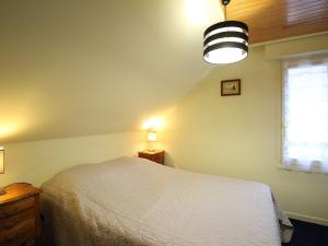 Posteľ alebo postele v izbe v ubytovaní Charmante maison 100m² au centre du Mont-Dore, patio, cour, garage, 6 pers, idéale pour famille - FR-1-415-134
