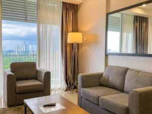 Posezení v ubytování Encorp Marina Suites by Nest Home at Puteri Harbour