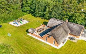 an overhead view of a large house with a yard at Stunning Home In Ulfborg With Sauna in Ulfborg +17 photos