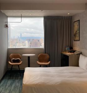 Katil atau katil-katil dalam bilik di 西門雲町旅店 Sky Gate Hotel
