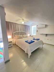 Voodi või voodid majutusasutuse Stanza Mare Beach Front toas