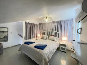 Voodi või voodid majutusasutuse Stanza Mare Beach Front toas