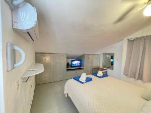 Voodi või voodid majutusasutuse Stanza Mare Beach Front toas