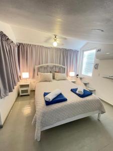 Voodi või voodid majutusasutuse Stanza Mare Beach Front toas