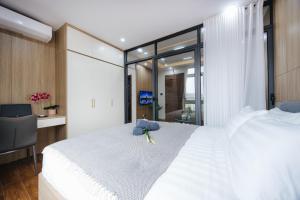 Crescendo Unique Studio客房内的一张或多张床位