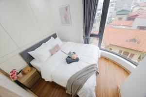 Crescendo Unique Studio客房内的一张或多张床位