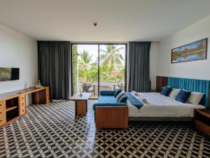 a hotel room with a bed and a television at Villa Sun - Boutique Hotel in Siem Reap +23 photos