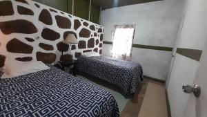 Postel nebo postele na pokoji v ubytování Posada Casa Sofía