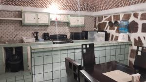 Kuchyň nebo kuchyňský kout v ubytování Posada Casa Sofía