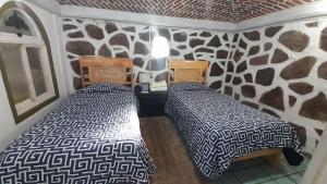 Postel nebo postele na pokoji v ubytování Posada Casa Sofía