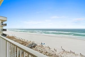 a view of the beach from the balcony of a condo at Sea Dunes 502 Beach Oasis Beachfront Condo with Pool Hot Tub Free Beach Service 0488 in Fort Walton Beach