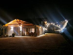 a house at night with some lights on it at Chata Lea in Levoča