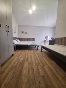 Postel nebo postele na pokoji v ubytování Villa Magnolia