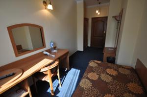 Posteľ alebo postele v izbe v ubytovaní Matejko Hotel