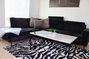 Posezení v ubytování Les Homes - Modern & Cozy Stay Near Oslo Airport