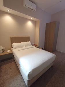 Ein Bett oder Betten in einem Zimmer der Unterkunft Hyba Heritage Guest House