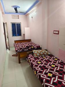 Imagine din galeria proprietății RS Homestay Puri în Puri +24 fotografii