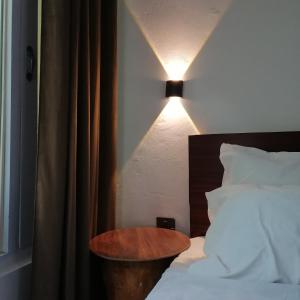 Postel nebo postele na pokoji v ubytování GreenLand Resort