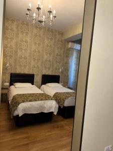 Postel nebo postele na pokoji v ubytování Hotel Diamond