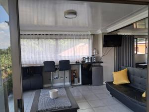 Ruang duduk di THE GALLARY INN, Kosmos, Hartbeespoort