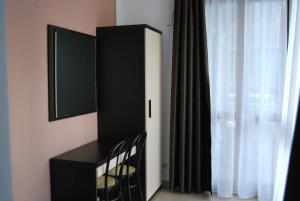 TV a/nebo společenská místnost v ubytování Villamelchiorre 1