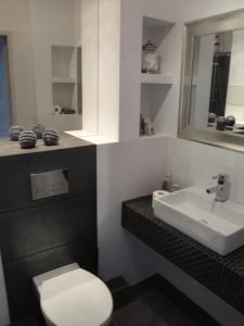 Phòng tắm tại Apartament Staromiejska