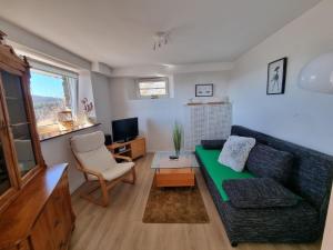 Posezení v ubytování Manderscheid Ferienwohnung mit Weitblick
