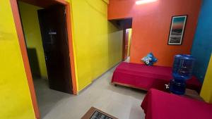 Postel nebo postele na pokoji v ubytování Hi5 Holiday Apartments - Udupi