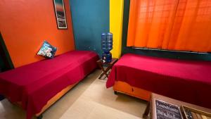 Postel nebo postele na pokoji v ubytování Hi5 Holiday Apartments - Udupi